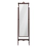 A mahogany cheval mirror Attributed to Whytock & Reid