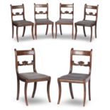 A set of six Regency Faux Rosewood and Brass- inlaid dining chairs