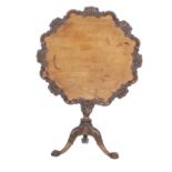 A George III style rococo mahogany tripod table