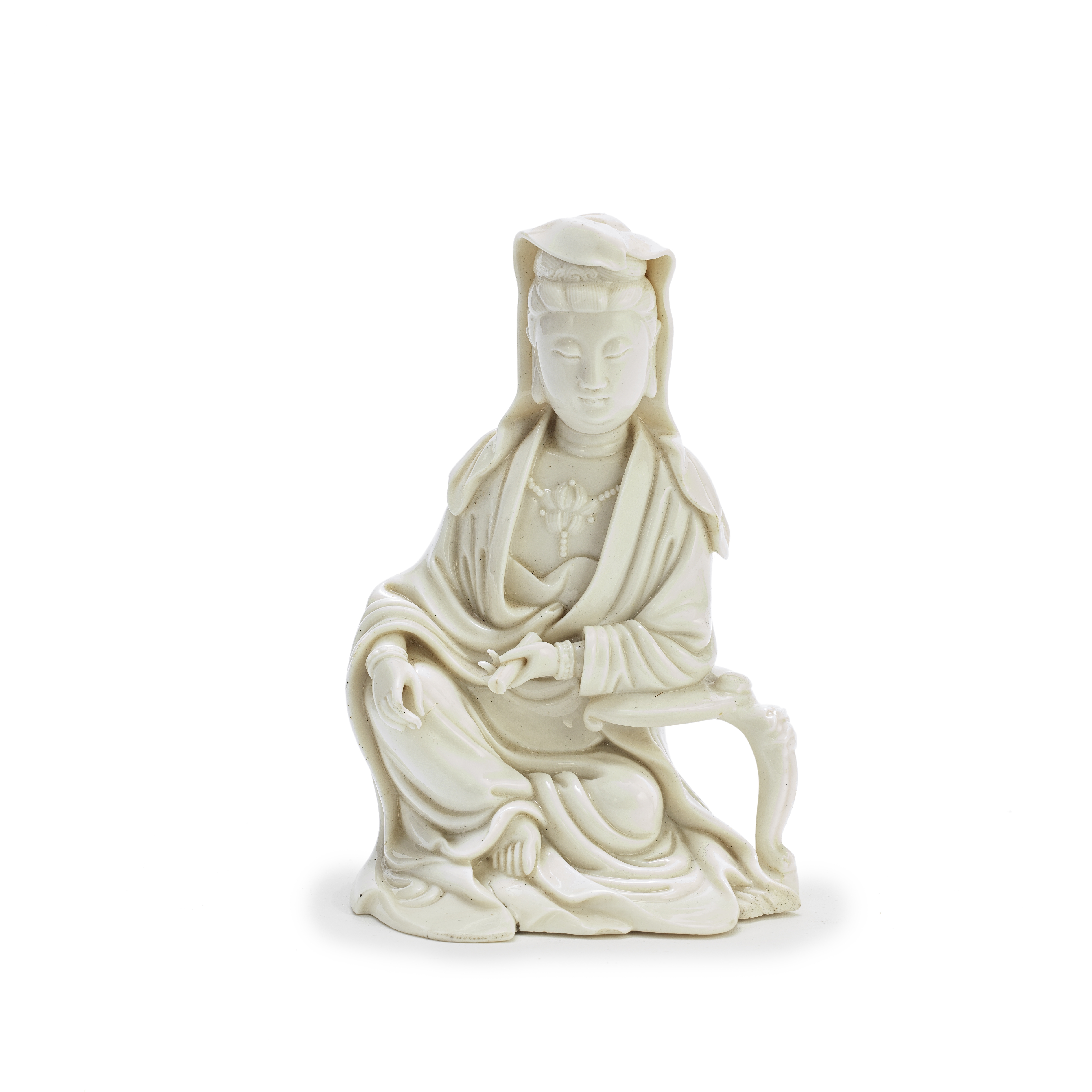 A BLANC-DE-CHINE FIGURE OF GUANYIN 18th century