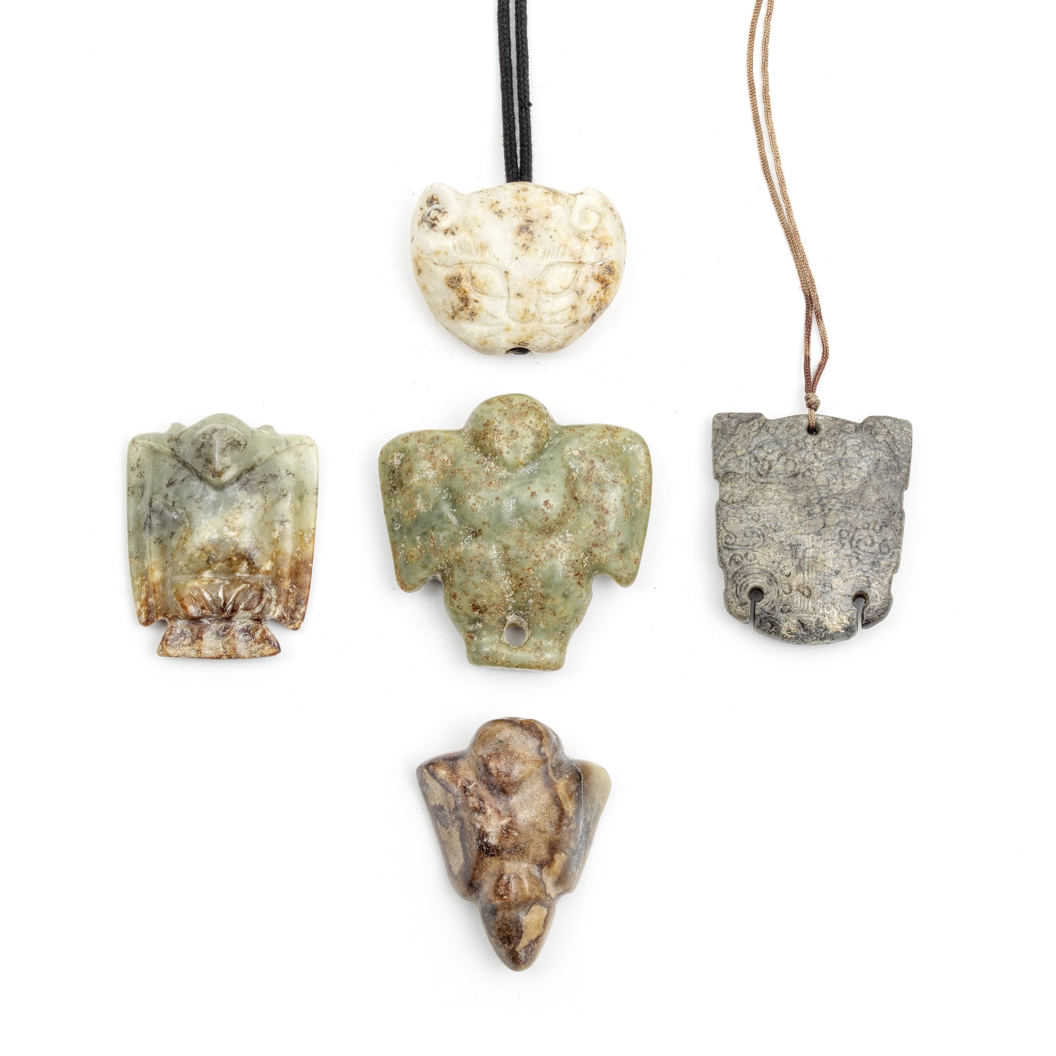 A GROUP OF FIVE ARCHAISTIC JADE PENDANTS (5)