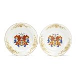 A PAIR OF FAMILLE ROSE 'DUTCH MARKET' ARMORIAL DISHES Qianlong (2)