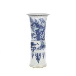 A BLUE AND WHITE BEAKER VASE, GU Shunzhi