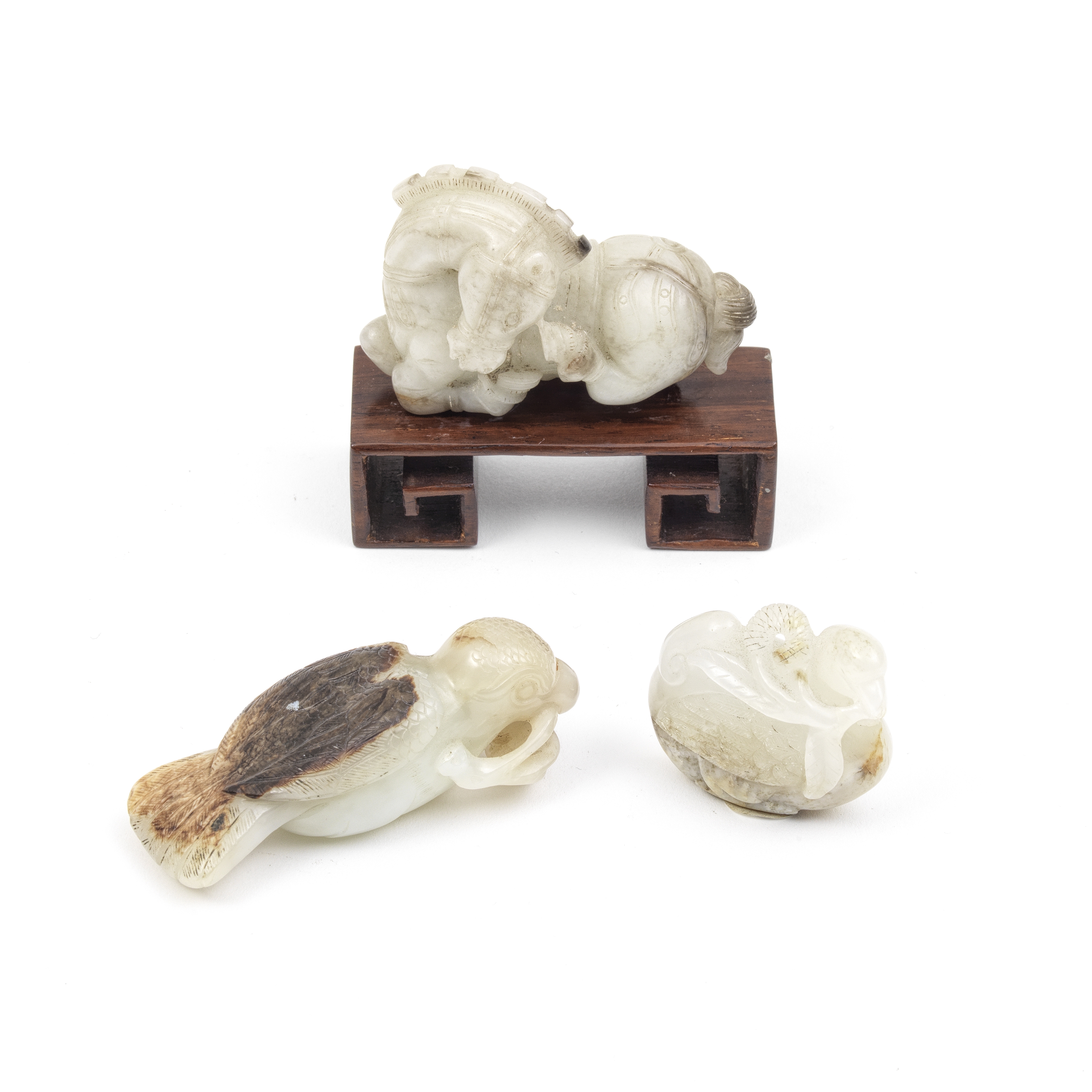 A GROUP OF THREE JADE ANIMALS 18th/19th century and later (4)