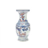 A BLUE AND WHITE AND COPPER-RED BALUSTER VASE 18th/19th century