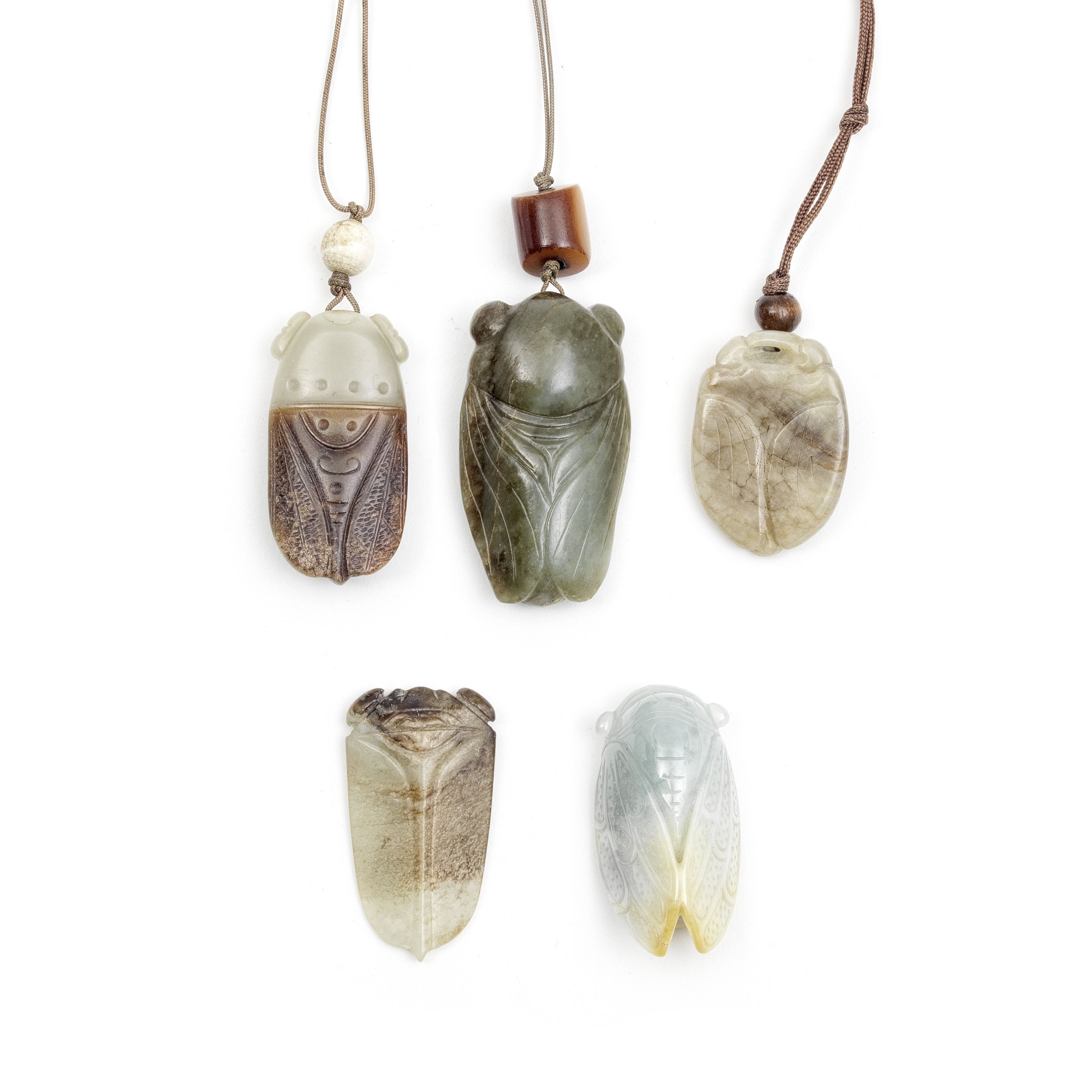 A GROUP OF FIVE JADE CICADA PENDANTS (5)