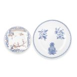A VERTE-IMARI DISH AND AN UNUSUAL BLUE AND WHITE 'BOTANICAL' CHARGER 18th century (2)