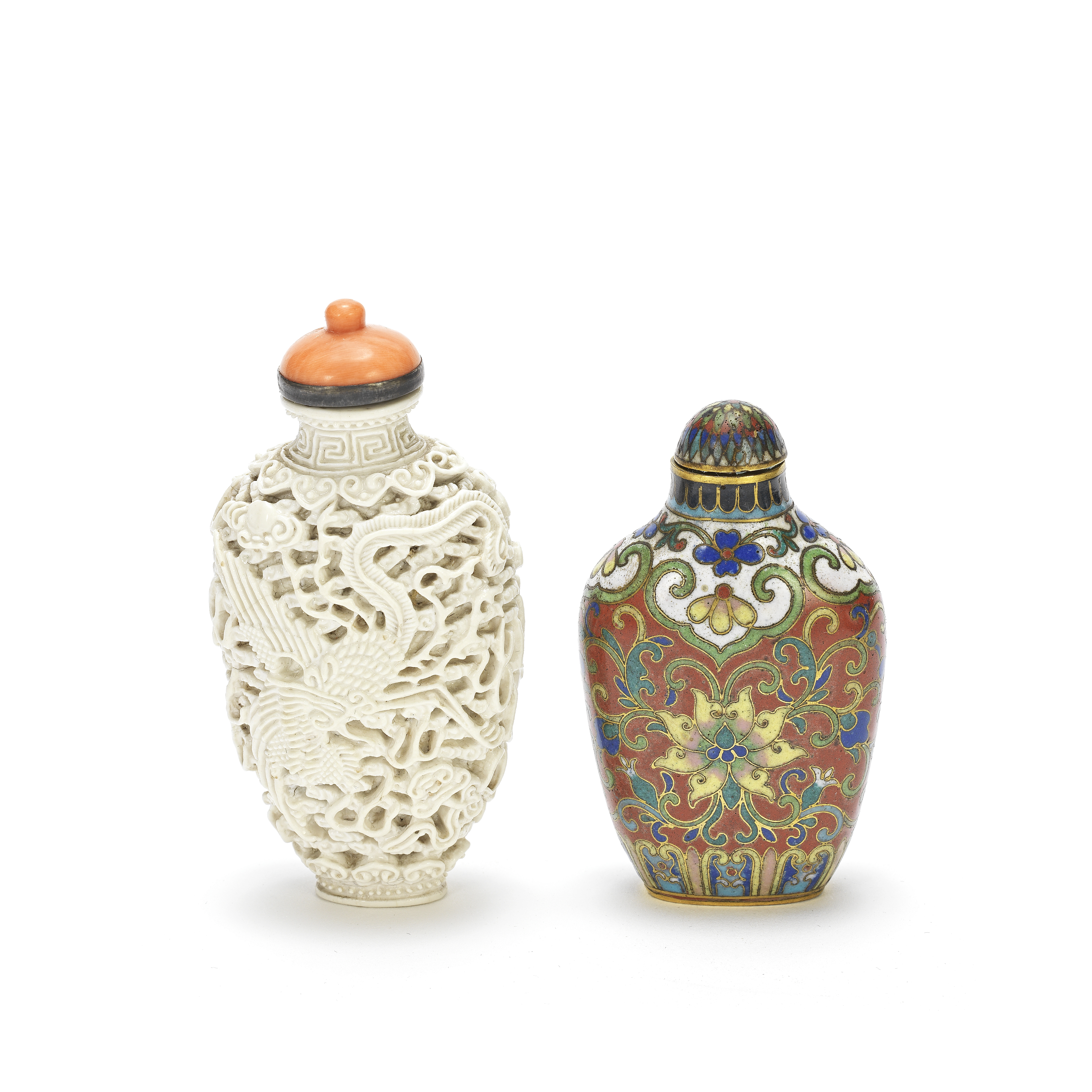 A CARVED SOFT-PASTE PORCELAIN 'DRAGON AND PHOENIX' SNUFF BOTTLE AND A CLOISONN&#201;-ENAMEL BOTTL...