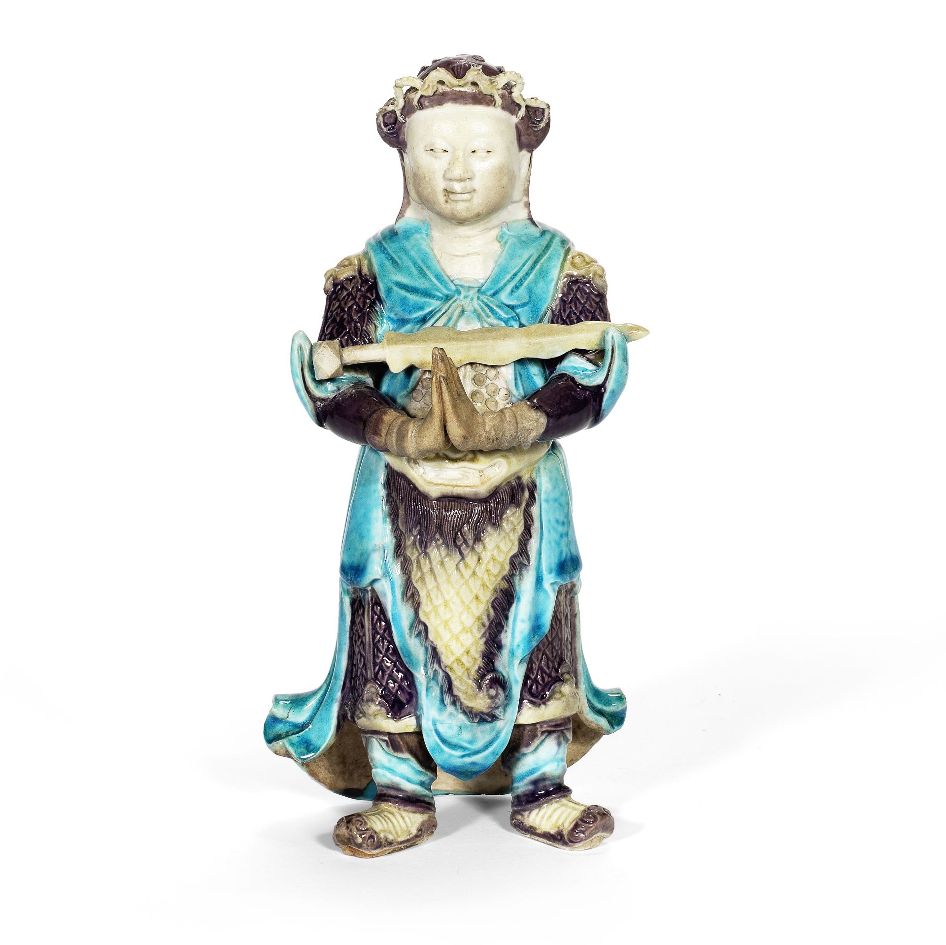 A FAHUA-GLAZED BISCUIT FIGURE OF WEITUO Kangxi
