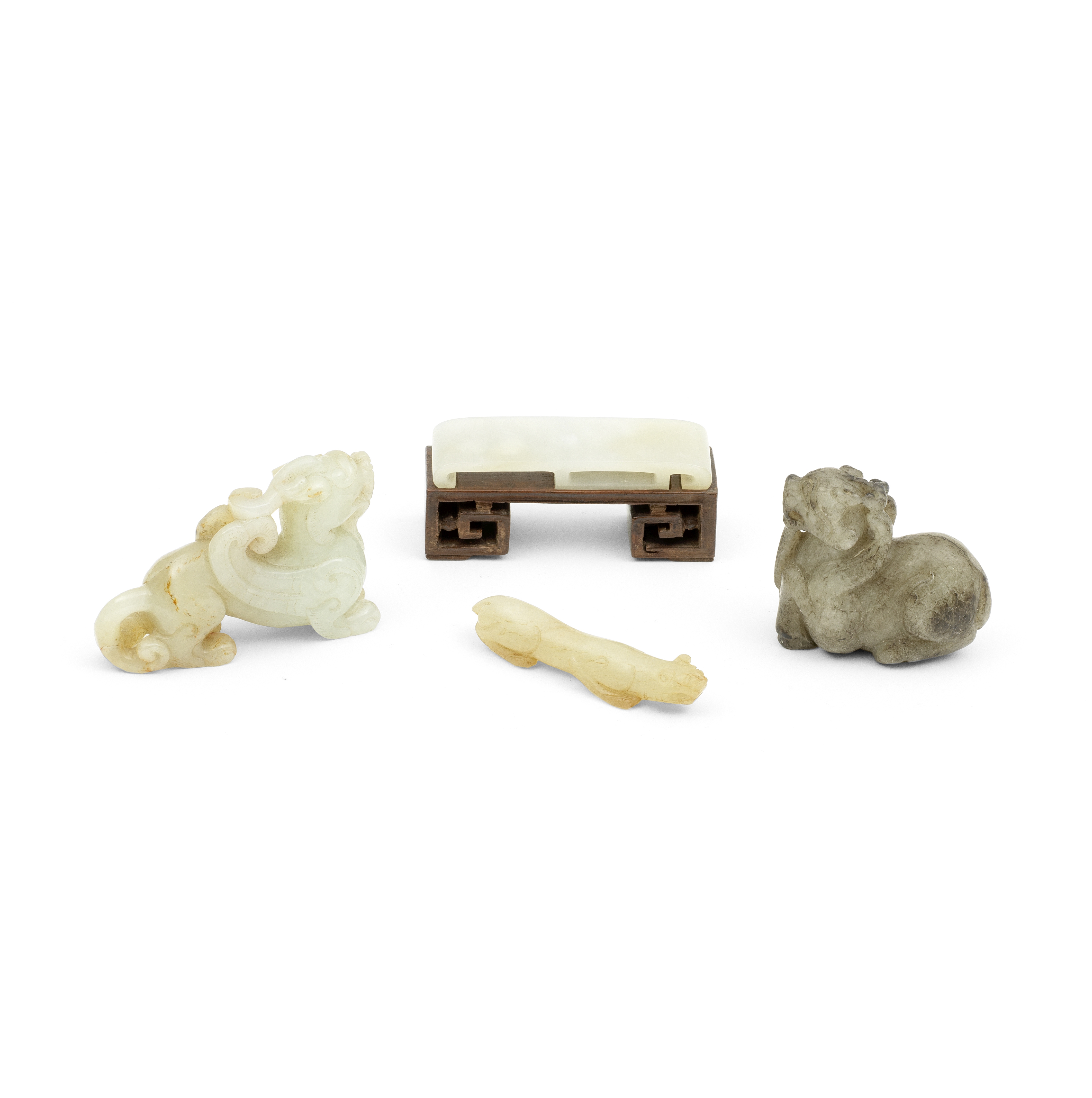 A GROUP OF FOUR JADE CARVINGS 18th century (5)