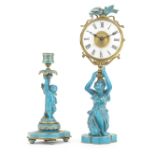 A gilt brass, frosted glass and turquoise glazed ceramic figural mystery time piece together with...