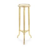 A late 19th / early 20th century carved and giltwood torchiere stand in the Regency style