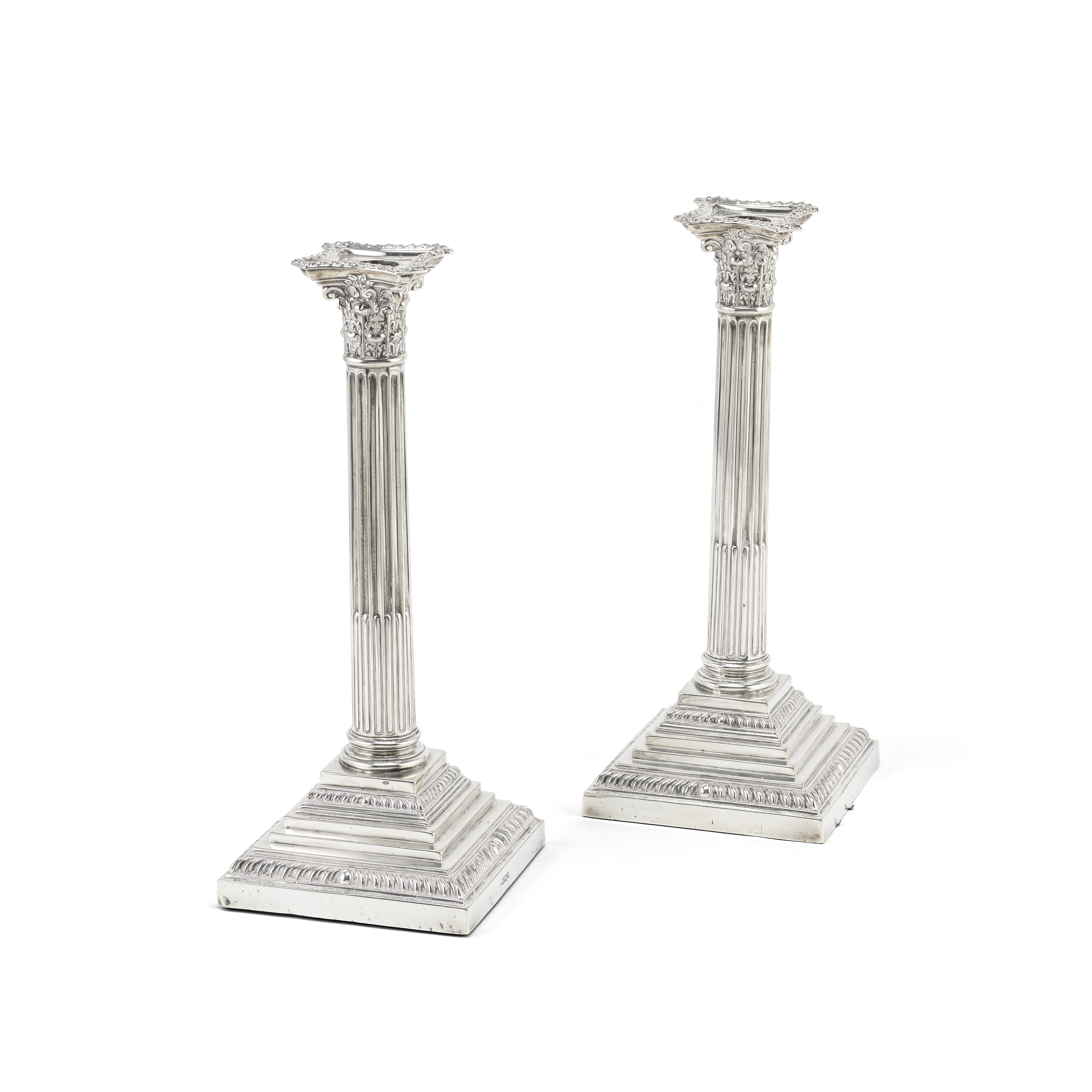 An Edwardian pair of silver Corinthian column candlesticks Walter Latham & Son, Sheffield 1909