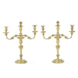 A pair of mid Victorian gilt copper three light candelabra in the Neo-Rococo style (2)