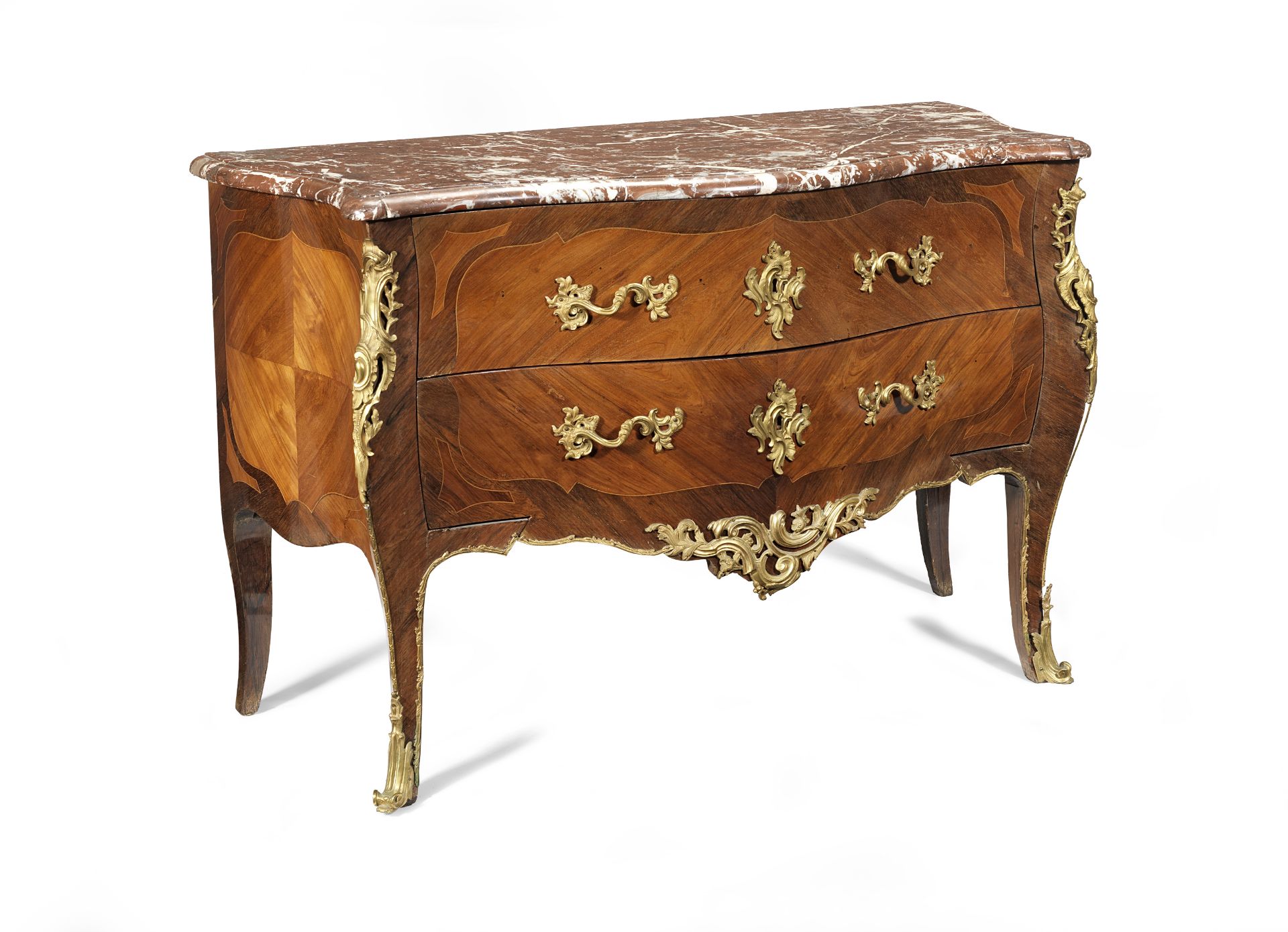 A Louis XV ormolu mounted tulipwood and rosewood serpentine commode