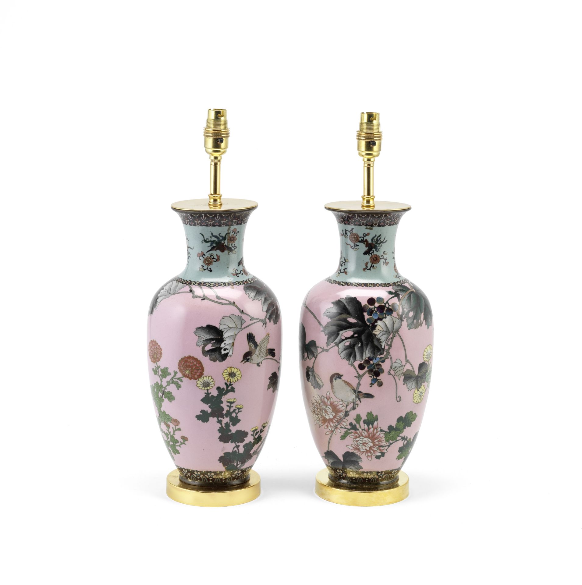 A pair of large pink ground cloisonne vase lamp bases of flattened baluster form late adapted as ...