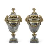 A pair of impressive late 19th century French gilt bronze mounted verde antico marble garniture u...