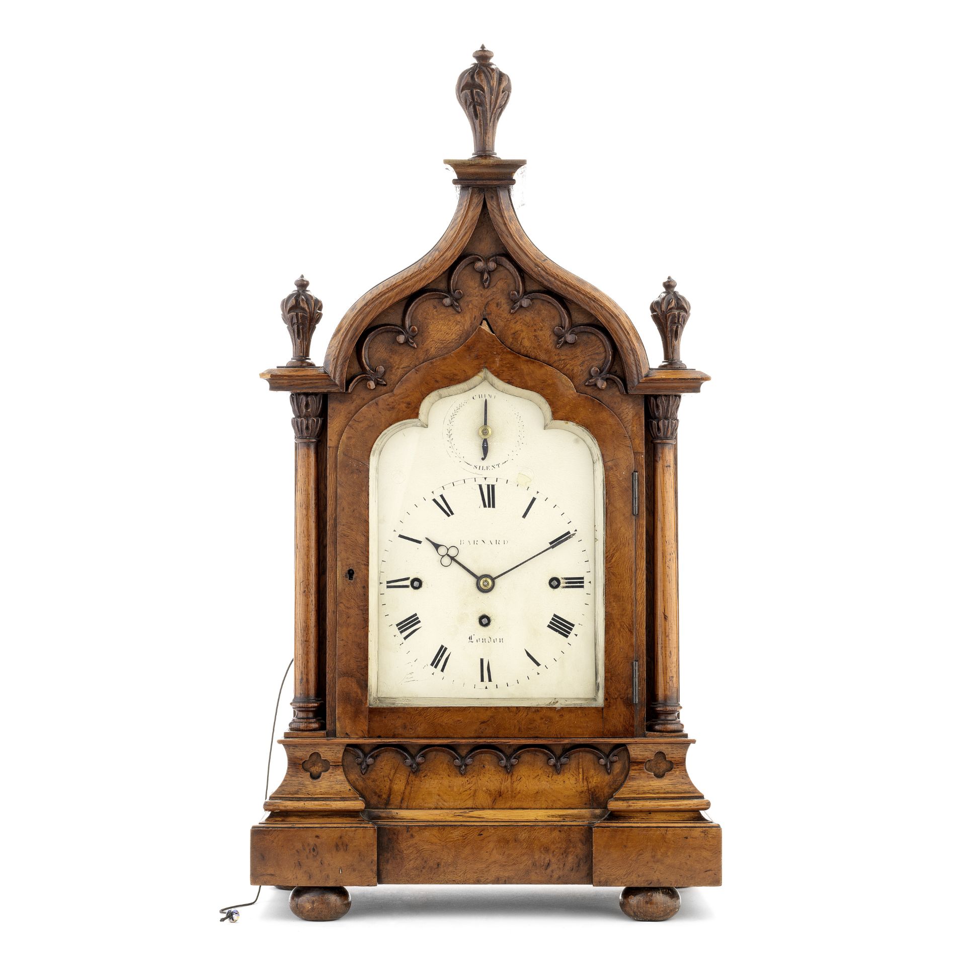 A mid 19th century oak chiming bracket clock with pull repeat the dial signed Barnard, London