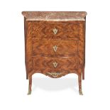 A French late 19th/early 20th century bois satine petit serpentine commode in the Louis XV style