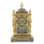 A late 19th century French gilt bronze and champleve enamel four glass mantel clock the movement ...