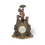 A late 19th century French patinated bronze mantel clock signed Raingo Freres, Paris
