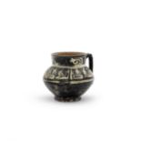 A slip-painted pottery mug Persia, 10th Century