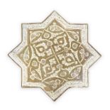 A large Kashan lustre pottery star tile from the Imamzadeh Yahya at Veramin Persia, circa 1262