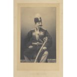 A studio portrait photograph of Nasr al-din Shah Qajar (reg. 1848-96) W. & D. Downey, Photographe...