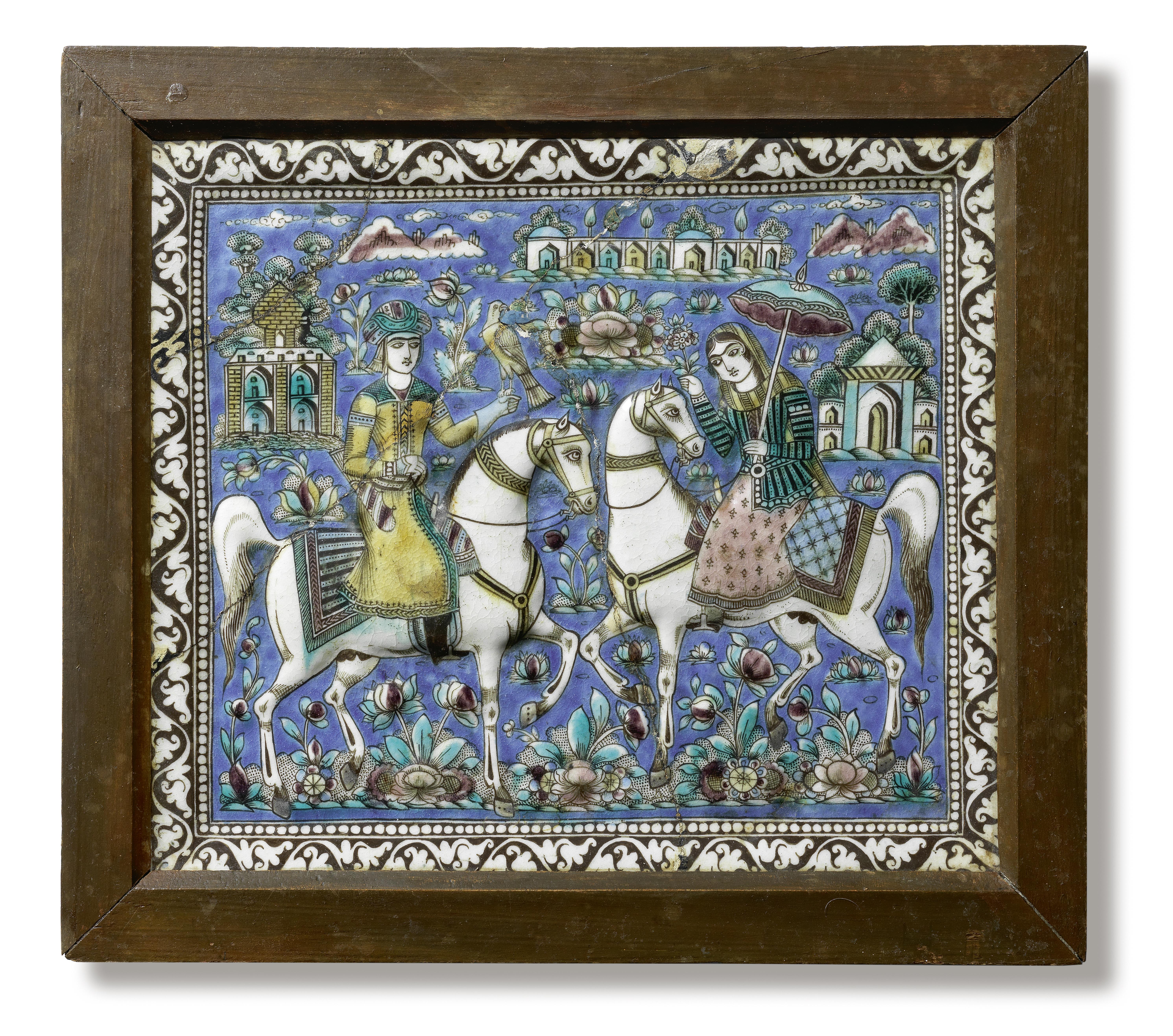 A Qajar moulded pottery tile depicting a prince and a maiden out hawking Persia, circa 1880