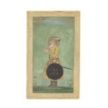 The Mughal Emperor Shah Jahan (reg. 1628-58) in old age, standing in a landscape armed with sword...