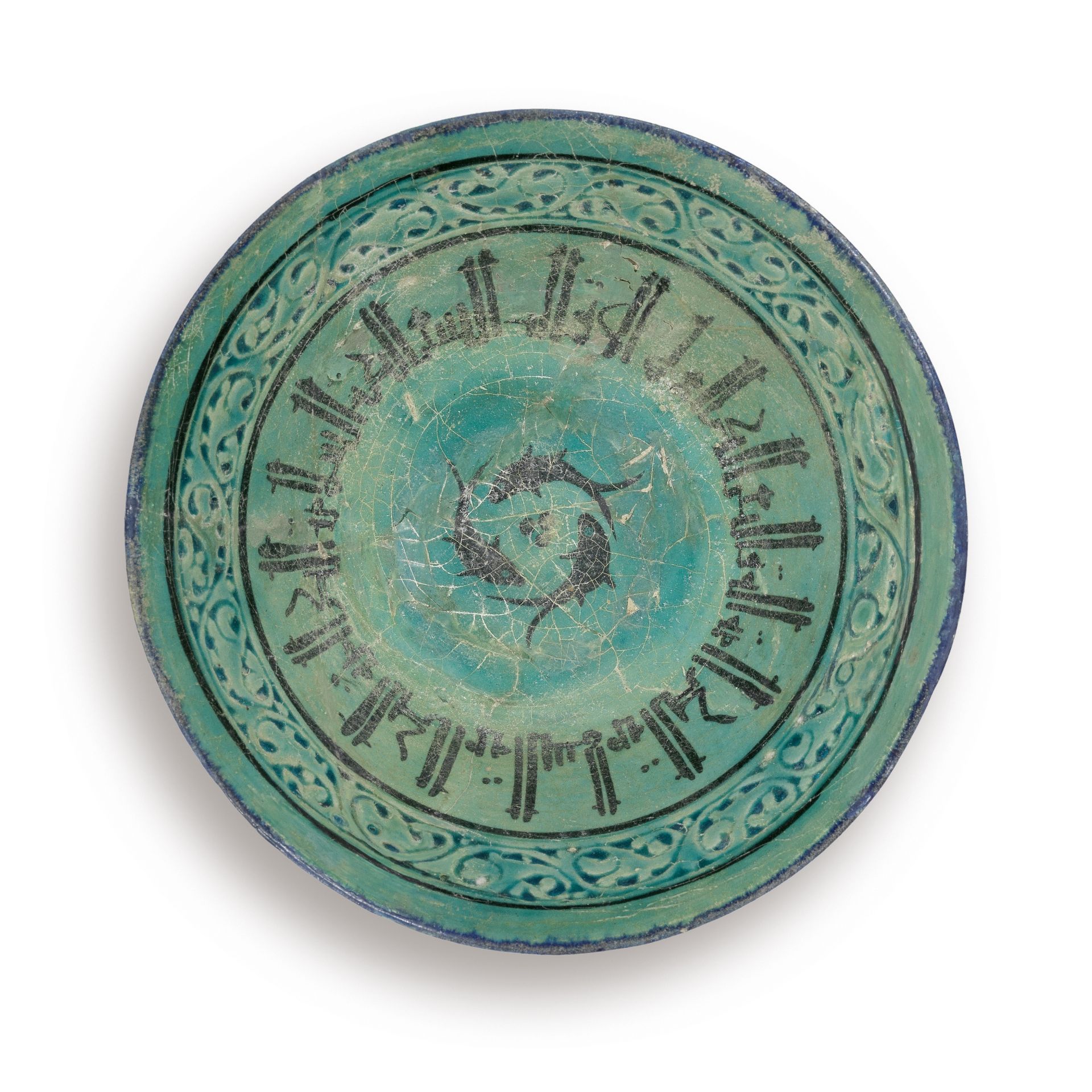 A Kashan pierced and incised underglaze-painted pottery bowl Persia, 12th Century