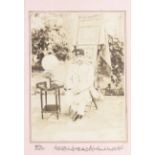 Three photographs depicting Muzaffar al-Din Shah Qajar (reg. 1896-1907), and one of Muhsin Khan M...