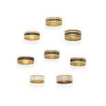 EIGHT GOLD AND ENAMEL MEMORIAL BAND RINGS, (8)