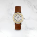 CARTIER. MONTRE BRACELET EN OR ET ACIER AVEC DATE MOUVEMENT QUARTZ CARTIER. A STAINLESS STEEL AND...