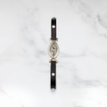 CARTIER. RARE MONTRE DE DAME EN PLATINE DE FORME OVALE MOUVEMENT MECANIQUE CARTIER. A RARE LADY'S...