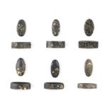 Six fuchi-gashira (hilt collars and pommels) Edo period (1615-1868), 18th to 19th century (12)