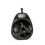 An ebony netsuke of a wasp in a rotting pear By Sangetsu, Edo period (1615-1868), mid 19th century