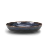 A HENAN BLACK-GLAZED SAUCER-DISH Jin Dynasty