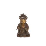 A PARCEL-GILT BRONZE FIGURE OF GUANYIN 16th/17th century