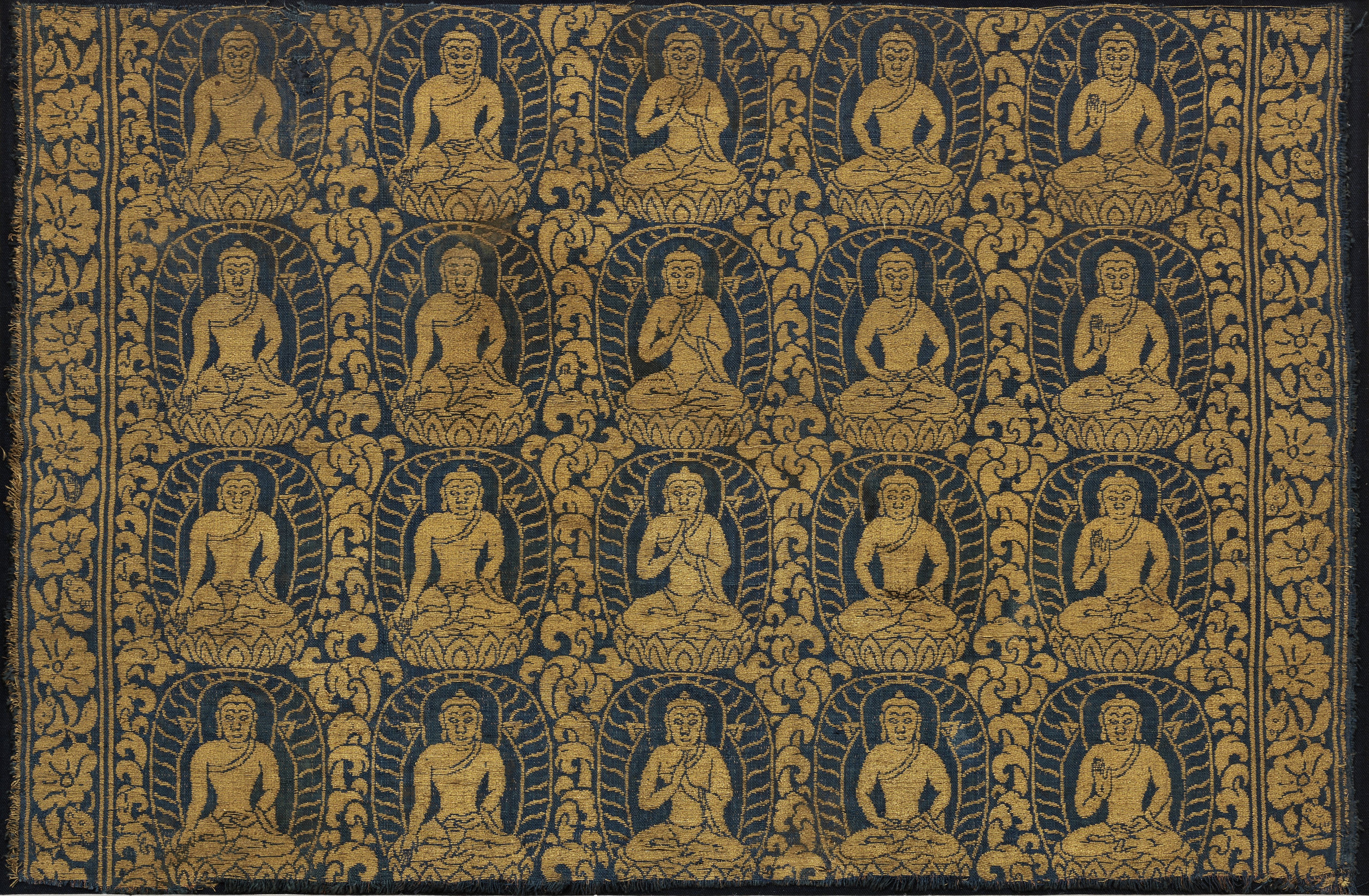 A RARE BLUE SILK LAMPAS 'FIVE DHYANI BUDDHAS' PANEL 10th-13th century 43cm (17in) wide x 28.5cm (...