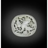 A pale green jade openwork 'Spring Water' oval plaque Ming Dynasty