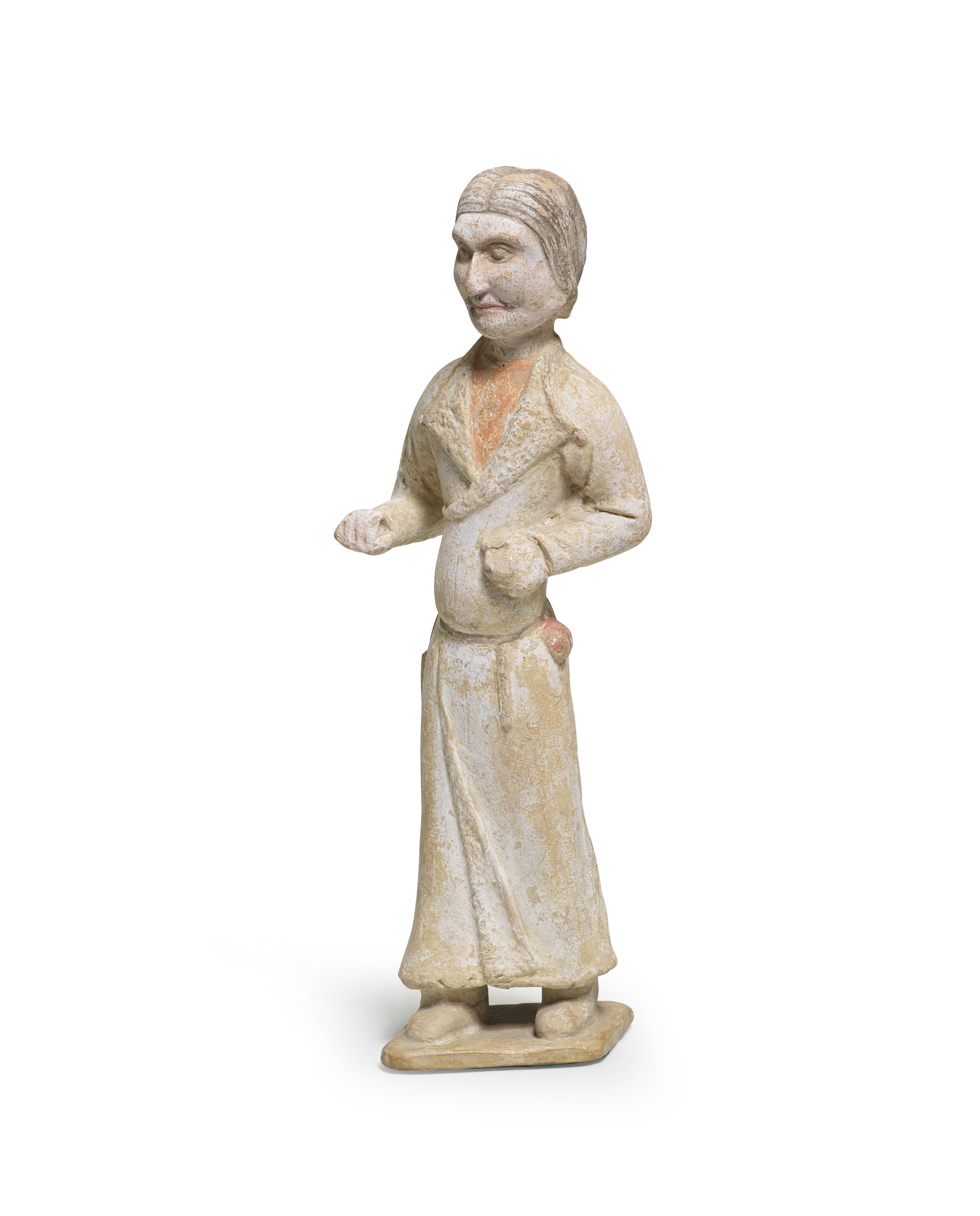 A PAINTED POTTERY FIGURE OF A FOREIGN GROOM Tang Dynasty