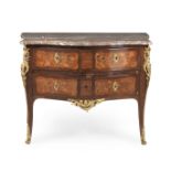 A Louis XV ormolu mounted tulipwood, amaranth and marquetry serpentine commode by Jean Popsel