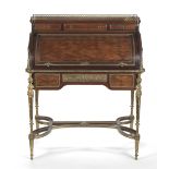 A French late 19th century ormolu mounted mahogany and bois satine parquetry bureau a cylindre or...