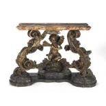 An Italian late 17th/early 18th century giltwood console table of Venetian origin, the simulated ...