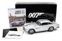 A finely detailed 1:8 scale model of the James Bond 'Goldfinger' Aston Martin DB5 constructed by ...