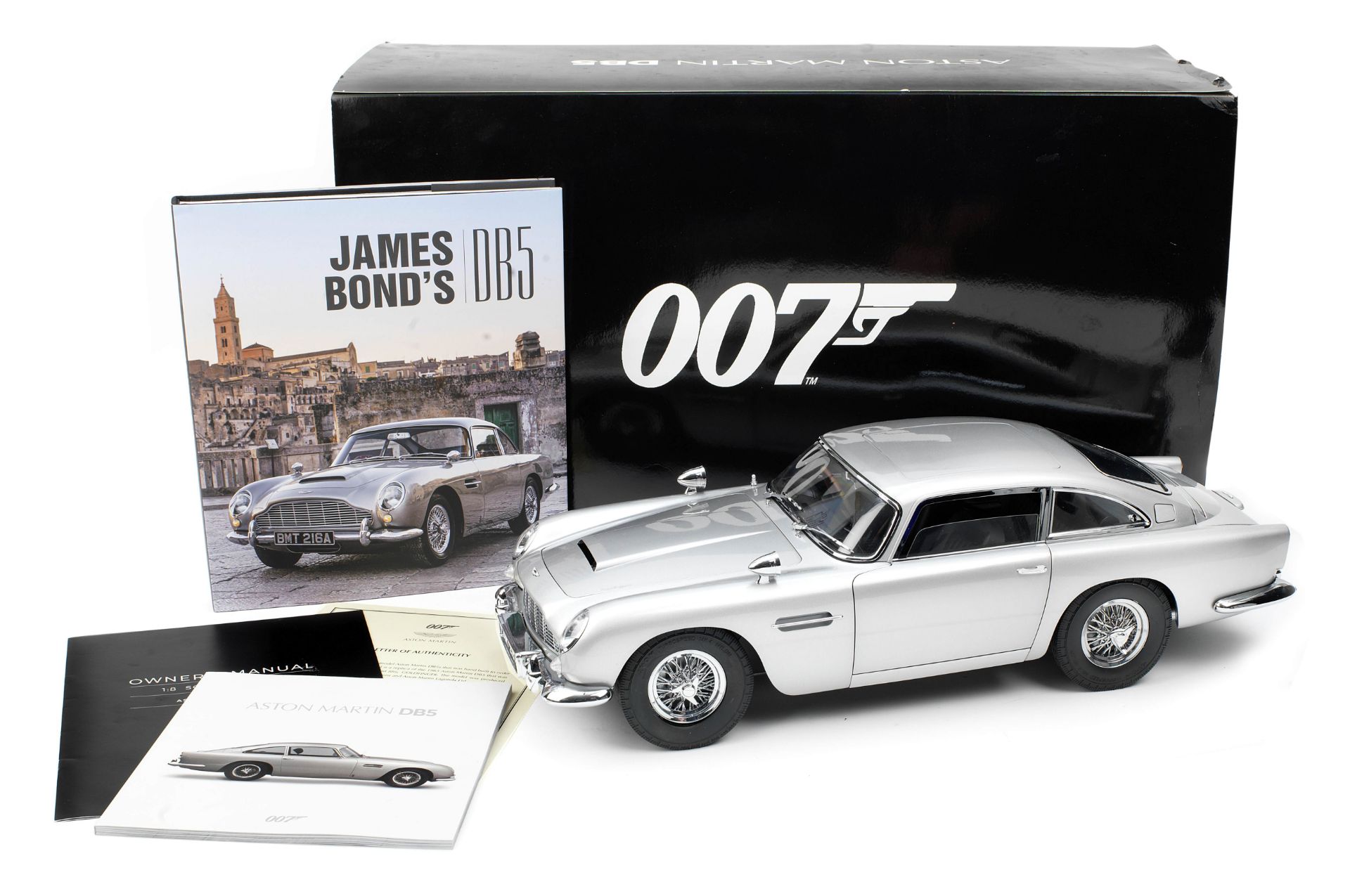 A finely detailed 1:8 scale model of the James Bond 'Goldfinger' Aston Martin DB5 constructed by ...