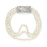 TRIPLE ROW CULTURED PEARL NECKLACE WITH ART DECO DIAMOND BROOCH/CLASP, CIRCA 1935