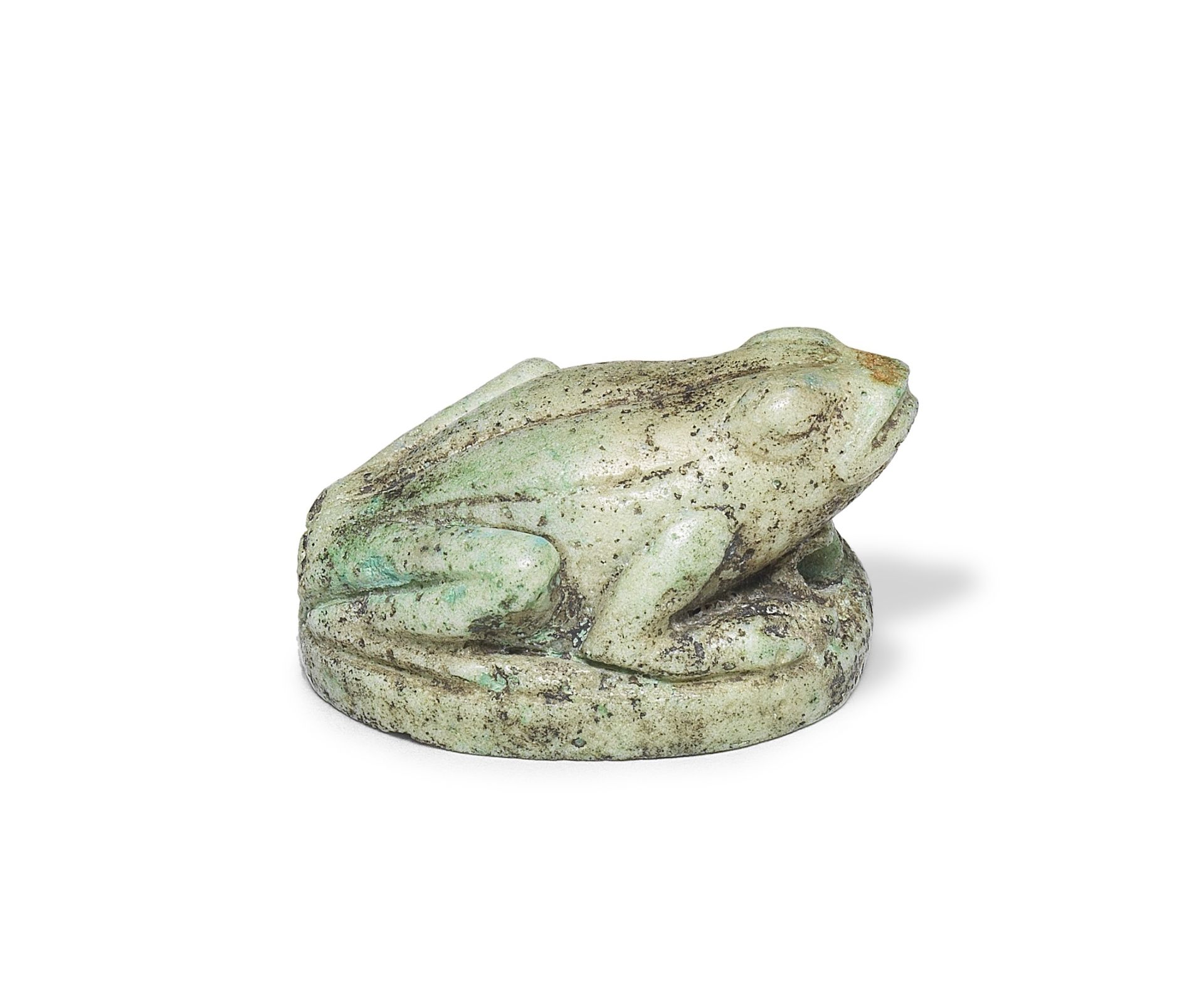 An Egyptian feldspar frog amulet