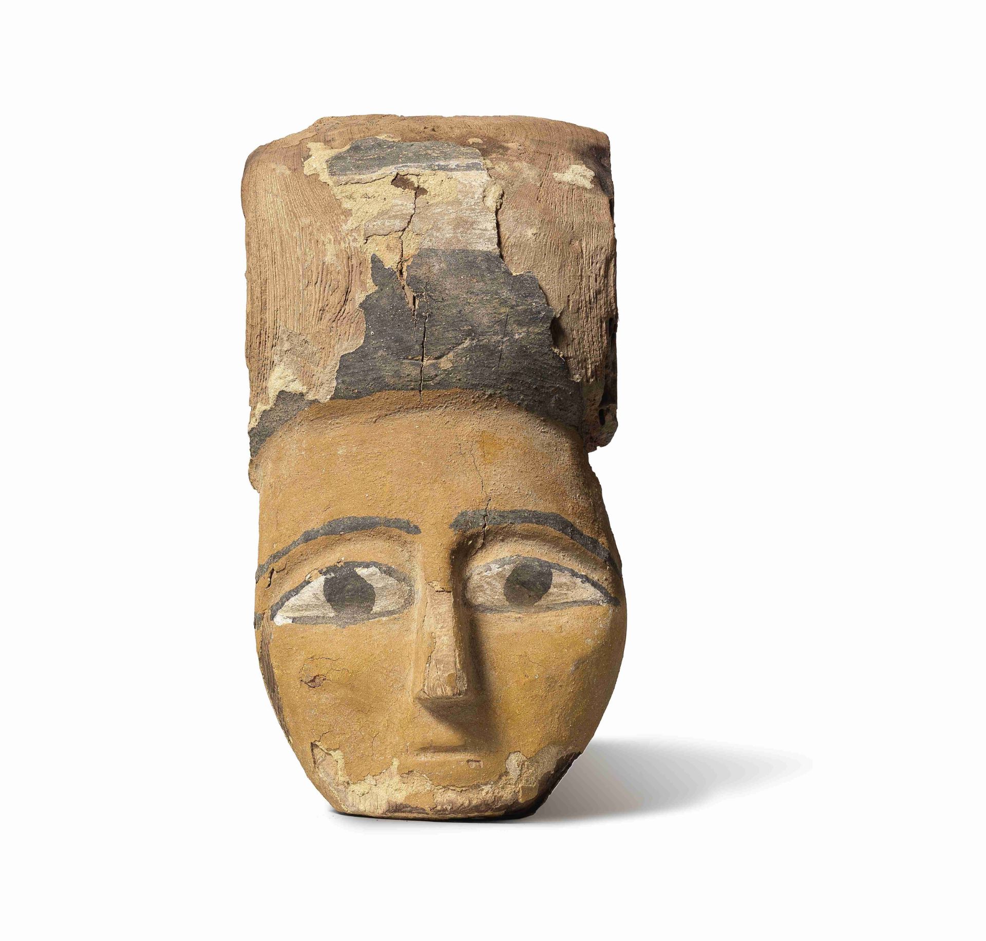 An Egyptian painted polychrome wood sarcophagus mask